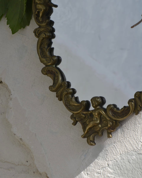 Vintažinis prancūziško baroko stiliaus žalvarinis veidrodis.